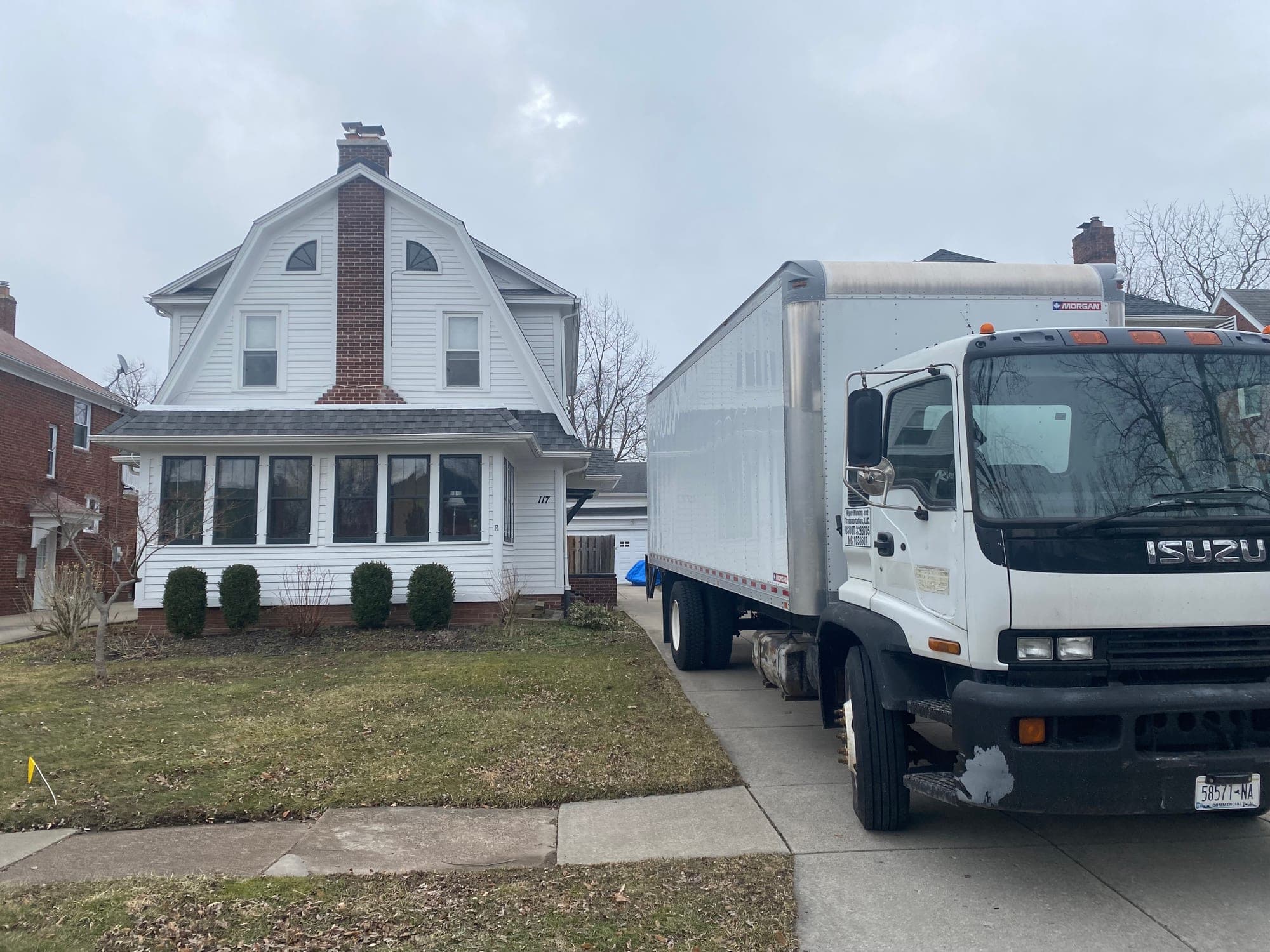 A Kiper truck parked at a Buffalo home on moving day